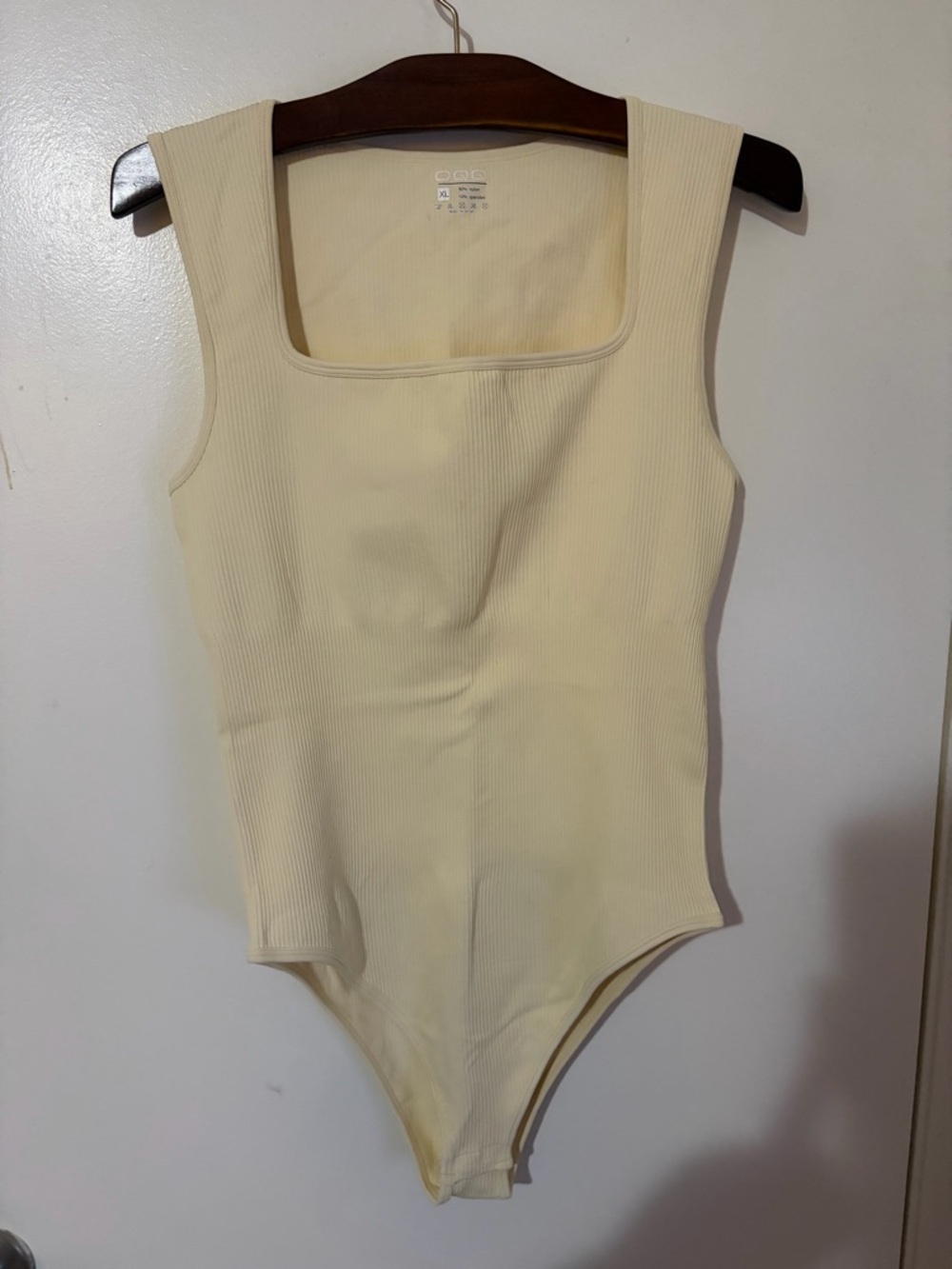 OQQ Cream Ribbed Square Neck One-Piece Bodysuit